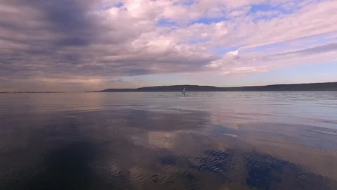 Optimist sail along Stock Footage 113945817