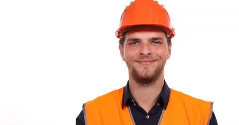Optimistic Caucasian Engineer Man Wearing Safety Helmet Looking Camera Saluting Stock Footage 69711450