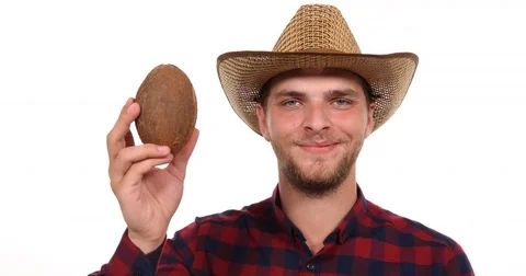 Optimistic Charming Farmer Man Showing Sweet Coco Nut Presentation Juicy Dessert Vidéo 69726607