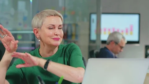 Optimistic developer dancing cheering software application success. Stock Footage 99241366