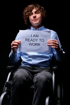 Optimistic disabled invalid man does not give up despite disability Stock Photos