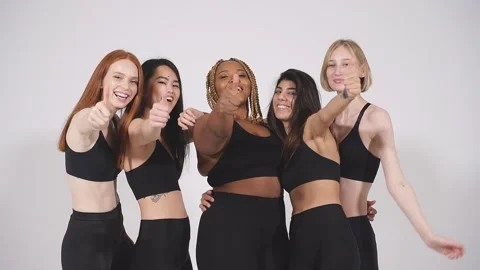 Optimistic diverse models showing thumbs up. Stock Footage 146363614