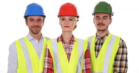 Optimistic Engineers Team Looking Camera and Showing Thumb Up Sign Workers Group Stock Footage 69707022