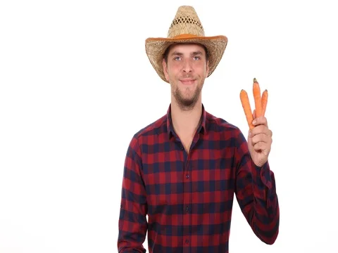 Optimistic Farmer Man Holding Bio Carrots Peasant Male Looking Camera Posing Stock Footage 73639098