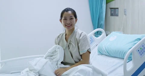 Optimistic healing journey a smiling patient's emotional well-being in a bright Video stock 323158207