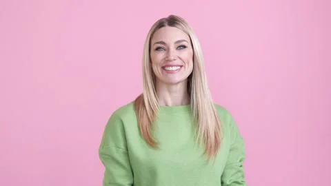 Optimistic lady touch hands shoulders jumper isolated pastel color background Stock Footage 169864671