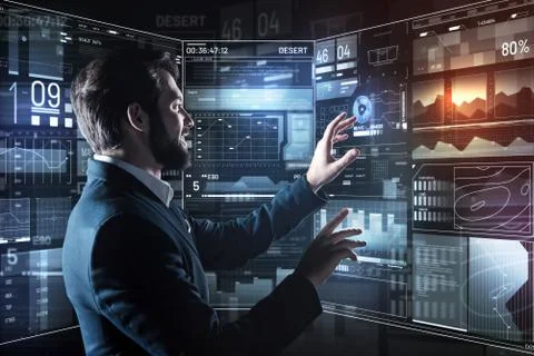 Optimistic programmer feeling happy while doing an easy part of work Stock Photos