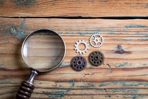 Optimization, Improvement and Development concept. Gears of different sizes and Stock Photos