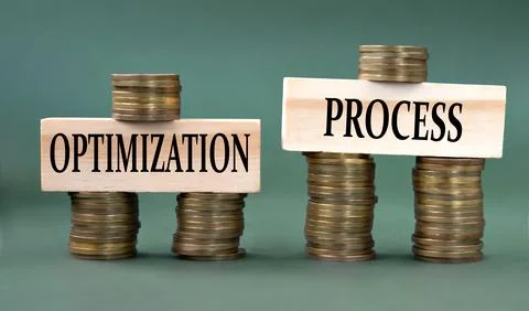 OPTIMIZATION PROCESS - words on a wooden block against the background of stac Stock Photos