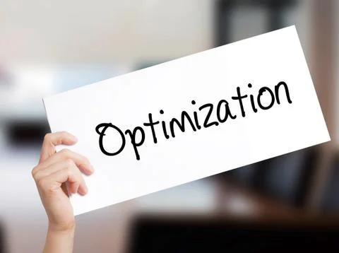 Optimization  Sign on white paper. Man Hand Holding Paper with text. Isolated Stock Photos