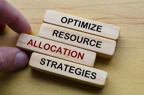 Optimize resource allocation strategies text on wooden blocks. Operational .. Stock Photos