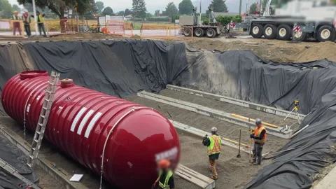 Optimized Slinger Backfill at Gas Station Tank Site: Precision in Pea Stock Footage 263608695