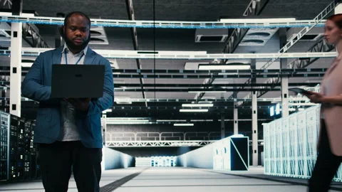 Optimizing electronics, laptop and team of software developers in server farm Video stock 330031737