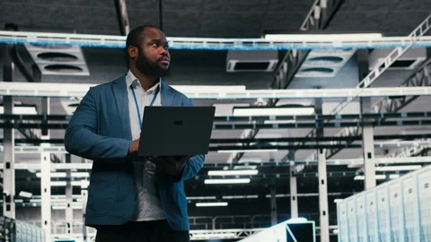 Optimizing electronics, laptop and team of software developers in server farm Video stock 330089811