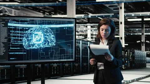 Optimizing equipment rigs, AI and smiling engineer in data center Stock Footage 329329136