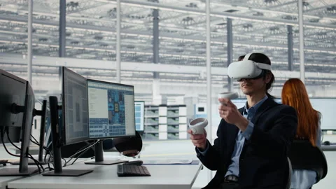 Optimizing microchip production, VR technology and engineer in factory Stock Footage 335880199
