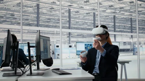 Optimizing microchip production, VR technology and engineer in factory Video stock 335881919