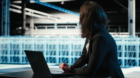 Optimizing server, laptop and software developer in data center Stock Footage 329333762