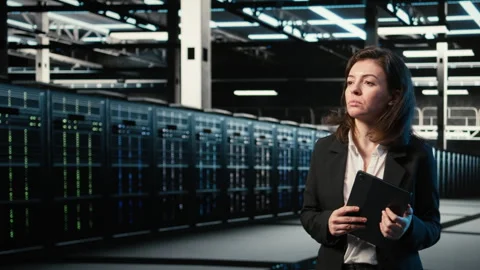 Optimizing server load, VFX compositing and female programmer in data center Video stock 330100728