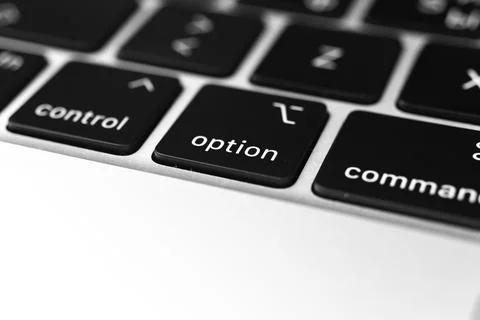 Option key and button on keyboard. Option sign close-up. Modern laptop Stock Photos