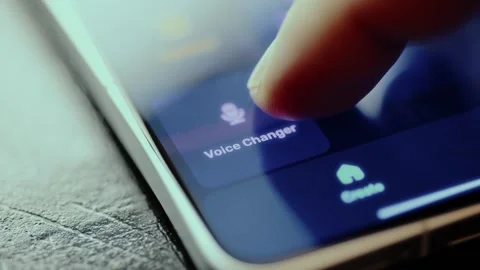 Option Voice Changer on a smartphone screen, function to modify the users voice Stock Footage 326945616