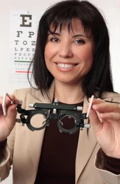 Optometrist holding trial frames Stock Photos