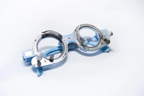 Optometrist trial frame close- up, test vision equipment isolated on white ba Stock Photos