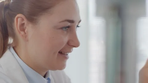 Optometrist Using Phoropter during Eye Exam Video stock 105569262