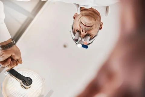 Optometry, below and a doctor with a light for a checkup, eye and vision care Stock Photos