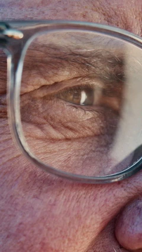 Optometry, closeup and elderly man with glasses for vision, eyesight and Video stock 340453283