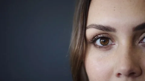 Optometry, eye care and face of woman in studio with contact lenses for Stock Footage 331496661