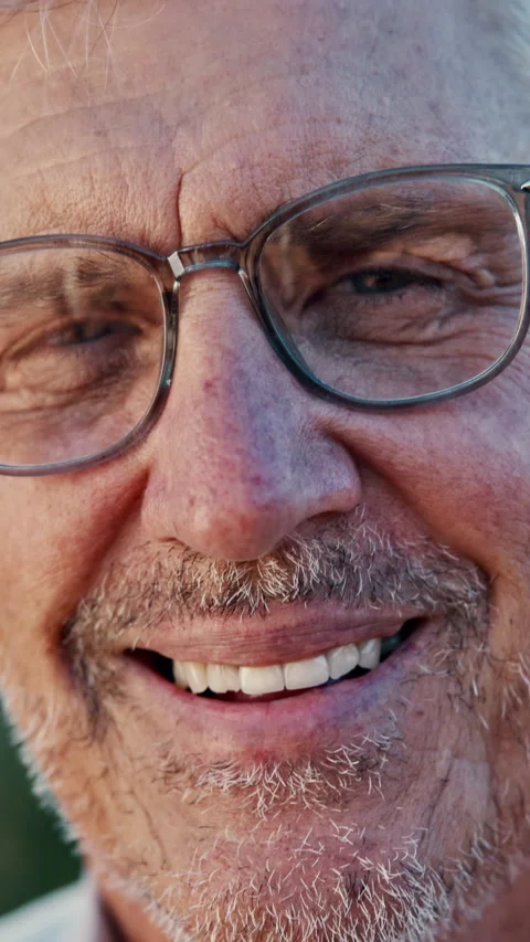 Optometry, face and elderly man with glasses, optical lenses and prescription Video stock 340453657