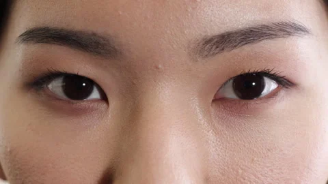Optometry, face or eyes with assessment, blink or glaucoma screening in vision Stock Footage 336651060