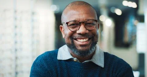 Optometry, happy or black man in store with glasses, eyewear expert or pride in Stock Photos
