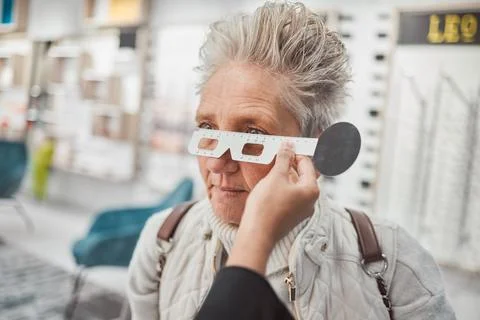 Optometry, measurement and doctor testing eyes of a woman for glasses, frame Stock Photos
