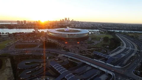 Optus Stadium and Perth city skyline at sunset aerial tracking footage Stock Footage 101895722