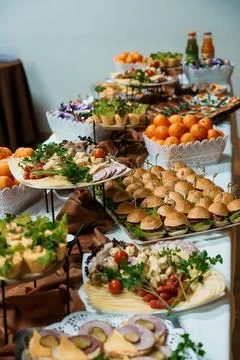 An opulent buffet table overflows with an exquisite array of culinary delight Stock Photos
