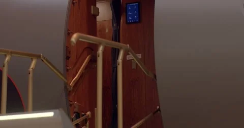 Opulent private airplane entry showcasing staircase and luxurious cabin elements Vidéo 333892708