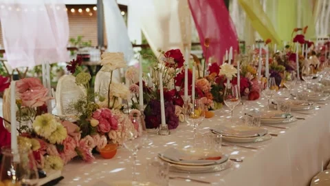 Opulent wedding decor with candles and blossoms, Luxurious floral arrangement Stock Footage 324677359
