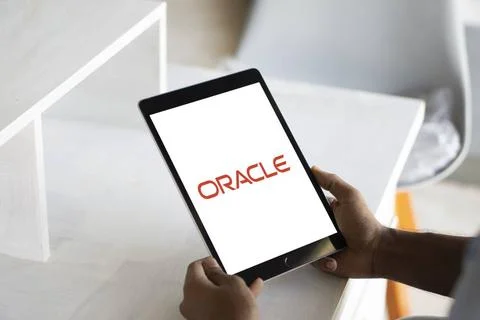  ORACLE logo displayed on smartphone screen. ORACLE is a multinational com... Foto stock