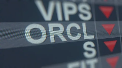 ORACLE ORCL stock ticker with decreasing arrow, conceptual Editorial crisis Stock Footage 119549015