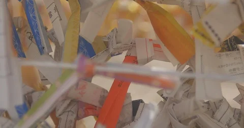 Oracle on the string at Asakusa shrine middle shot back shallow focus Stock Footage 97293836