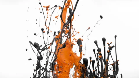 Oraneg and black paint bouncing and making splash. Slow Motion. Stock Footage 55421242
