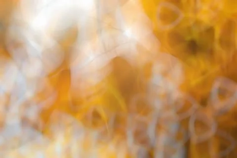 Orange abstract background blurred round objects Stock Photos