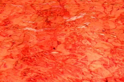 Orange abstract background of wavy water surface Stock Illustration