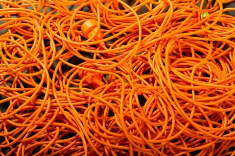 Orange abstract cable background, with interesting light. copy paste texture  Stock-Fotos