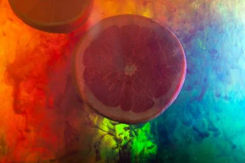 Orange on abstract color background Stock Photos