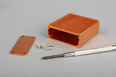 Orange aluminium enclosure for electronics projects Stock Photos