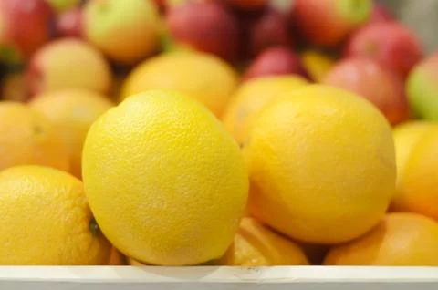 Orange and apple in stack Stock Photos