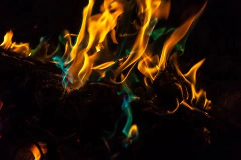 Orange and blue flames of fire Stock Photos